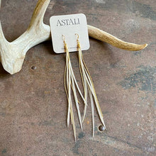 Load image into Gallery viewer, Long feather-like earrings on a card labeled 'ASTALI' with antlers in the background.

