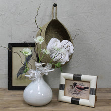 Load image into Gallery viewer, Decorative items including a vase with flowers, a framed picture, and a small hanging basket on a wooden surface.
