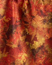 Load image into Gallery viewer, Towel fabric with autumn leaf pattern in red, orange, and brown colors.
