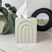 Load image into Gallery viewer, Decorative tissue box with arches on a marble surface, next to a plant and a framed picture.
