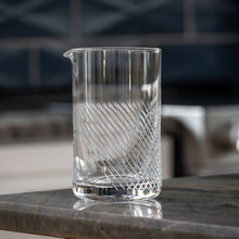 Load image into Gallery viewer, Clear  etched mixing glass with textured design on a marble surface
