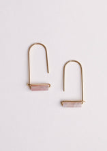 Load image into Gallery viewer, Pair of gold earrings with pink stones on a light gray background
