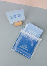 Load image into Gallery viewer, Calm Shower Affirmations pack with cards on a gray surface

