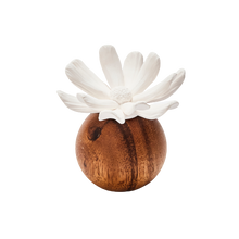 Load image into Gallery viewer, A decorative ceramic flower vase featuring a glossy brown wooden sphere base and a white daisy flower on top, set against a plain white background.

