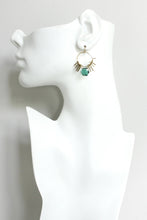 Load image into Gallery viewer, Turqouise and Gold Earrings on a White Bust
