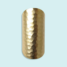 Load image into Gallery viewer, Gold metallic ring on a light blue background
