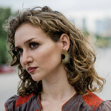 Load image into Gallery viewer, Woman with curly hair wearing a decorative earring outdoors
