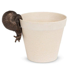 Load image into Gallery viewer, Beige ceramic planter with a snail on a white background
