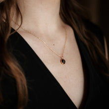 Load image into Gallery viewer, 8mm copper obsidian stone set in a bezel with a thick 24K gold deposition. It is suspended from an 18-inch paperclip chain
