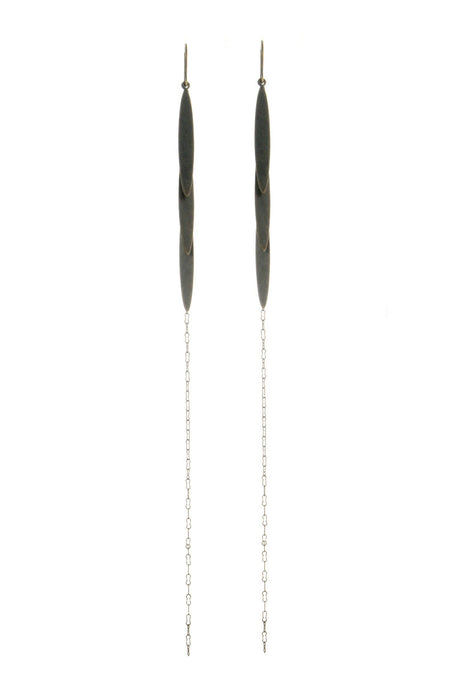 Pair of long, thin earrings with chain details on a white background
