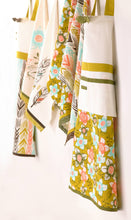 Load image into Gallery viewer, Feather Ikat Apron 100% cotton decorative buttons and bow apron 
