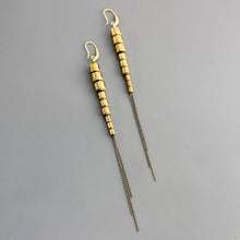 Load image into Gallery viewer, Gold brass beaded chain earrings on a gray background
