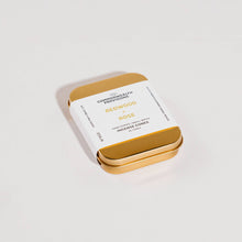 Load image into Gallery viewer, Gold tin of Incense Cones with label on a white background
