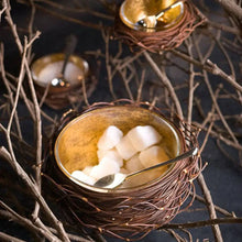 Load image into Gallery viewer, Gold bowl with sugar cubes and a spoon in a woven nest surrounded by branches.
