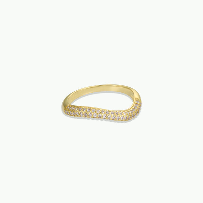 Gold ring with small diamonds on a white background