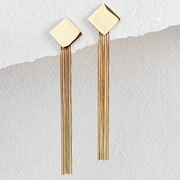 Gold earrings with square tops 