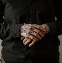 Load image into Gallery viewer, Person wearing a dark shirt with tattooed hands
