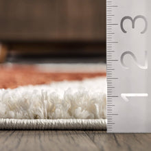 Load image into Gallery viewer, Close-up of a carpet sample with a ruler for scale on a wooden floor.
