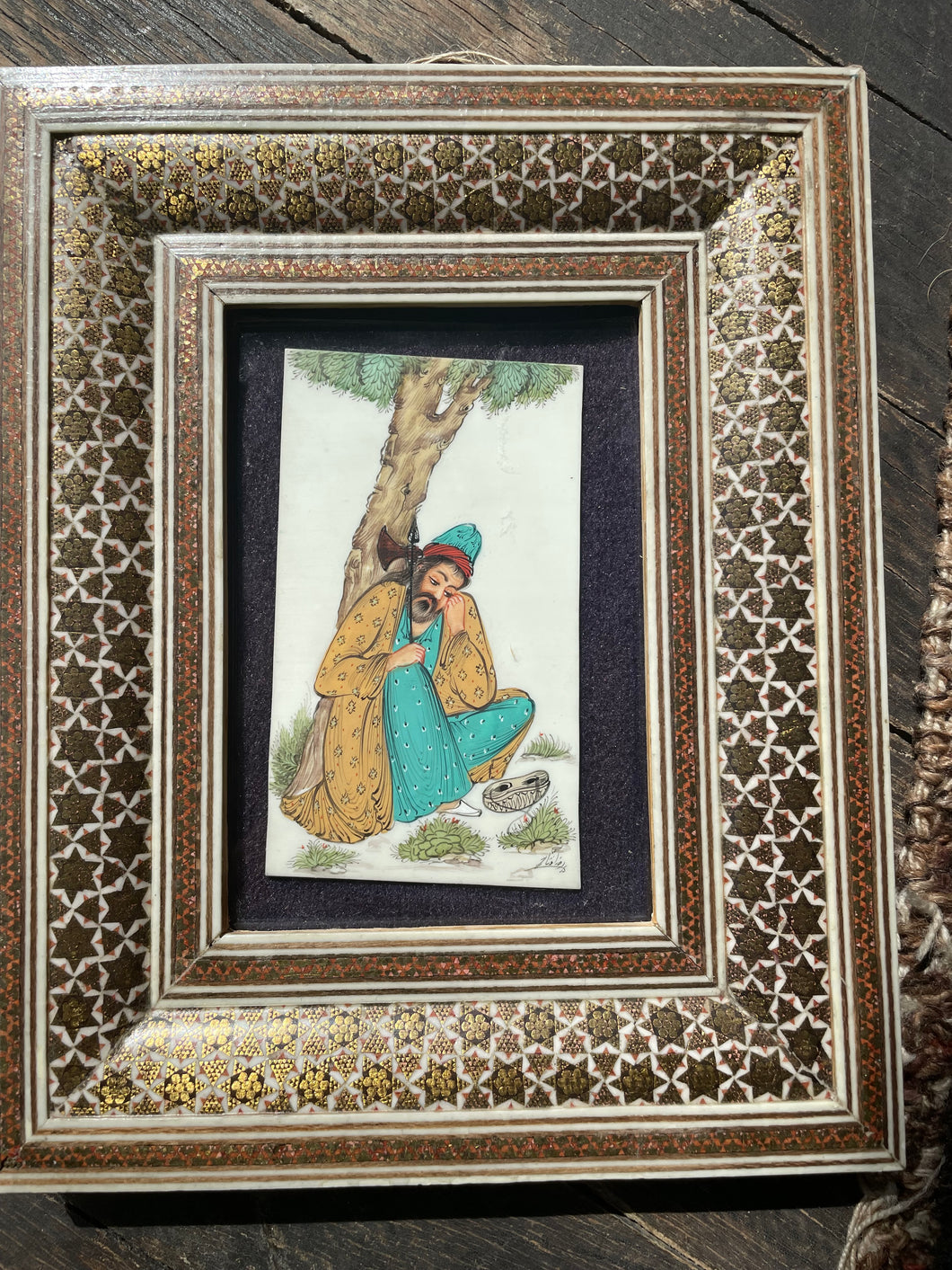iranian inlaid frame with tile art piece inside