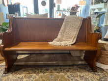 Load image into Gallery viewer, Wooden bench with a textured blanket draped over it in a room setting.
