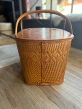 Load image into Gallery viewer, Woven basket with a lid on a wooden surface
