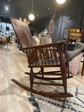 Load image into Gallery viewer, Wooden rocking chair in a room with wooden floor and furniture.
