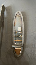 Load image into Gallery viewer, Oval wall mirror with shelves on a gray wall
