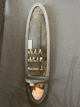 Load image into Gallery viewer, Oval mirror with shelf on a gray wall
