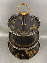 Load image into Gallery viewer, Three-tiered cake stand with gold floral patterns on a gray background
