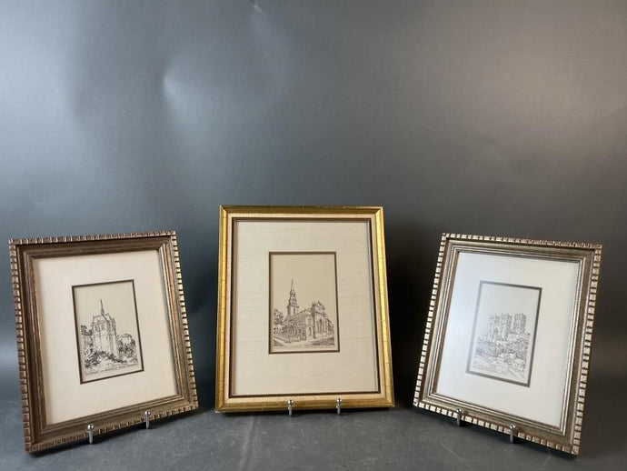  framed artworks of a cathedral and mill