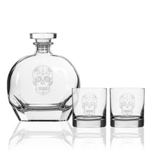 Load image into Gallery viewer, Clear glass decanter and two tumblers with skull designs on a white background
