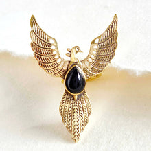 Load image into Gallery viewer, Gold bird-shaped ring with a black gemstone on a white background
