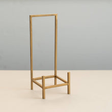 Load image into Gallery viewer, Gold iron bookstand or eisel 

