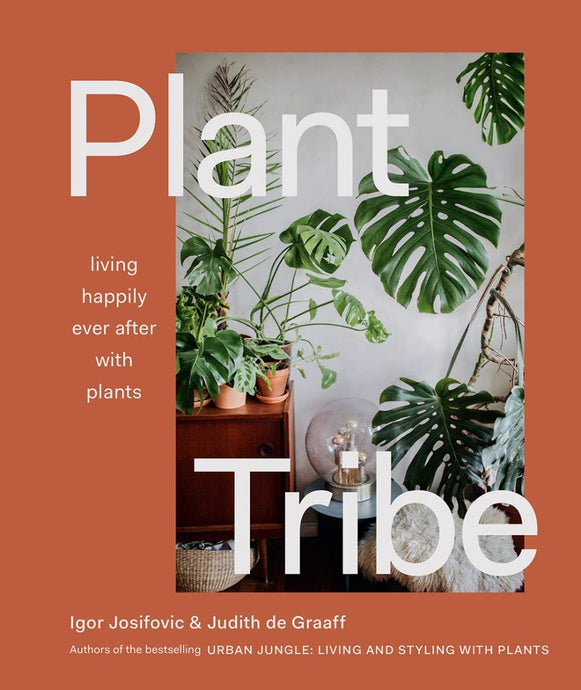 Book cover of 'Plant Tribe' with green plants and a warm brown background