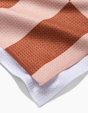 Load image into Gallery viewer, Close-up of a textured fabric with geometric pattern on a white background
