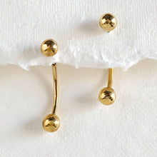 Load image into Gallery viewer, Pair of Arc ball stud Earrings in polished brass on a white background

