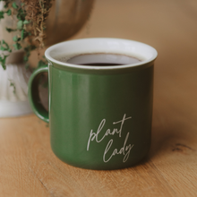 Load image into Gallery viewer, Green mug with 'plant lady' text on a wooden surface

