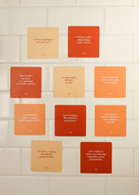Load image into Gallery viewer, Motivational cards with affirmations on a tiled wall
