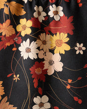 Load image into Gallery viewer, Close-up of floral fabric with red, yellow, and white flowers on a black background

