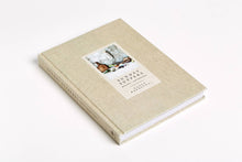 Load image into Gallery viewer, Beige photo album with a cover featuring an image and text on a white background
