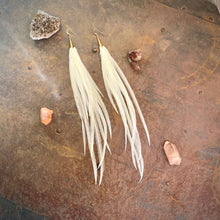 Load image into Gallery viewer, Long 8 inch ivory coque feather earring with gold cone and hook
