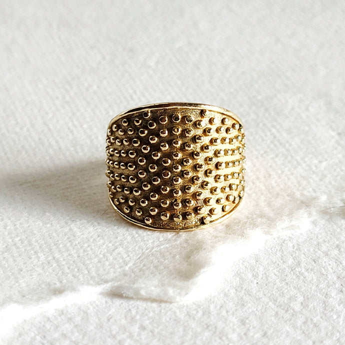 studded circle brass ring