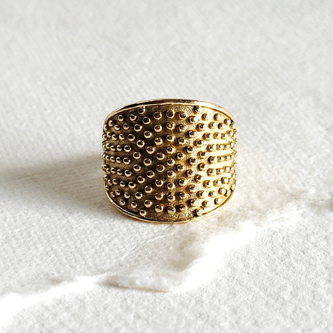studded circle brass ring