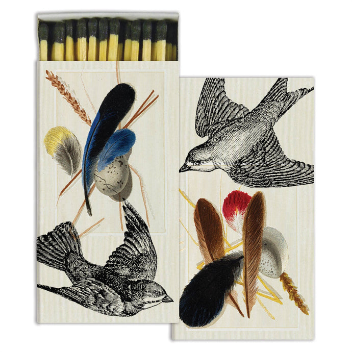 birds and feathers match box with black tipped matches