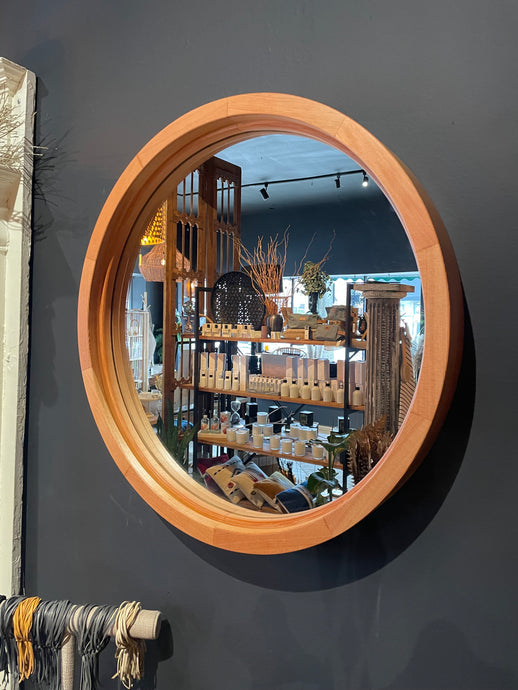 Round mirror by Freddy Hills