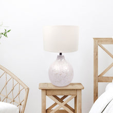 Load image into Gallery viewer, Mother of Pearl table lamp on a bed side table
