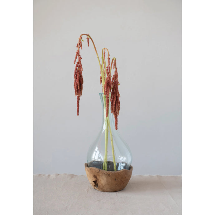 Recycled glass vase shaped to sit loosly in teakwood round base